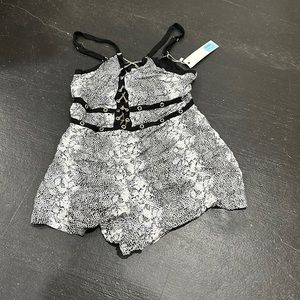 Beautiful Millau romper. Strappy. Cool design.